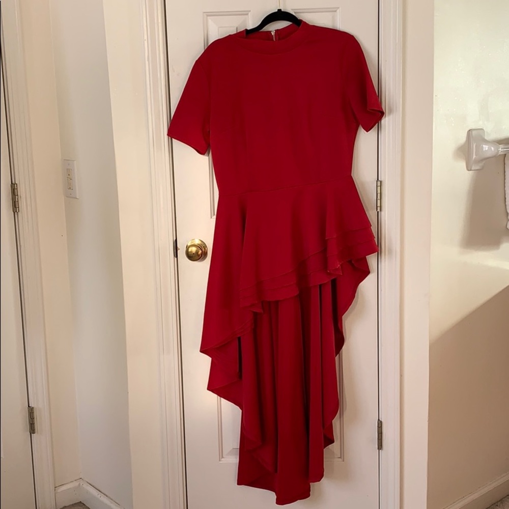 This is a ruffled red dress that fits a size 2xL.